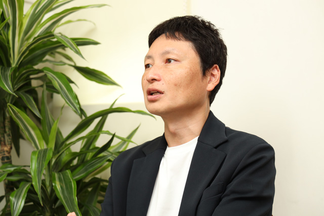 話している菊地さん
